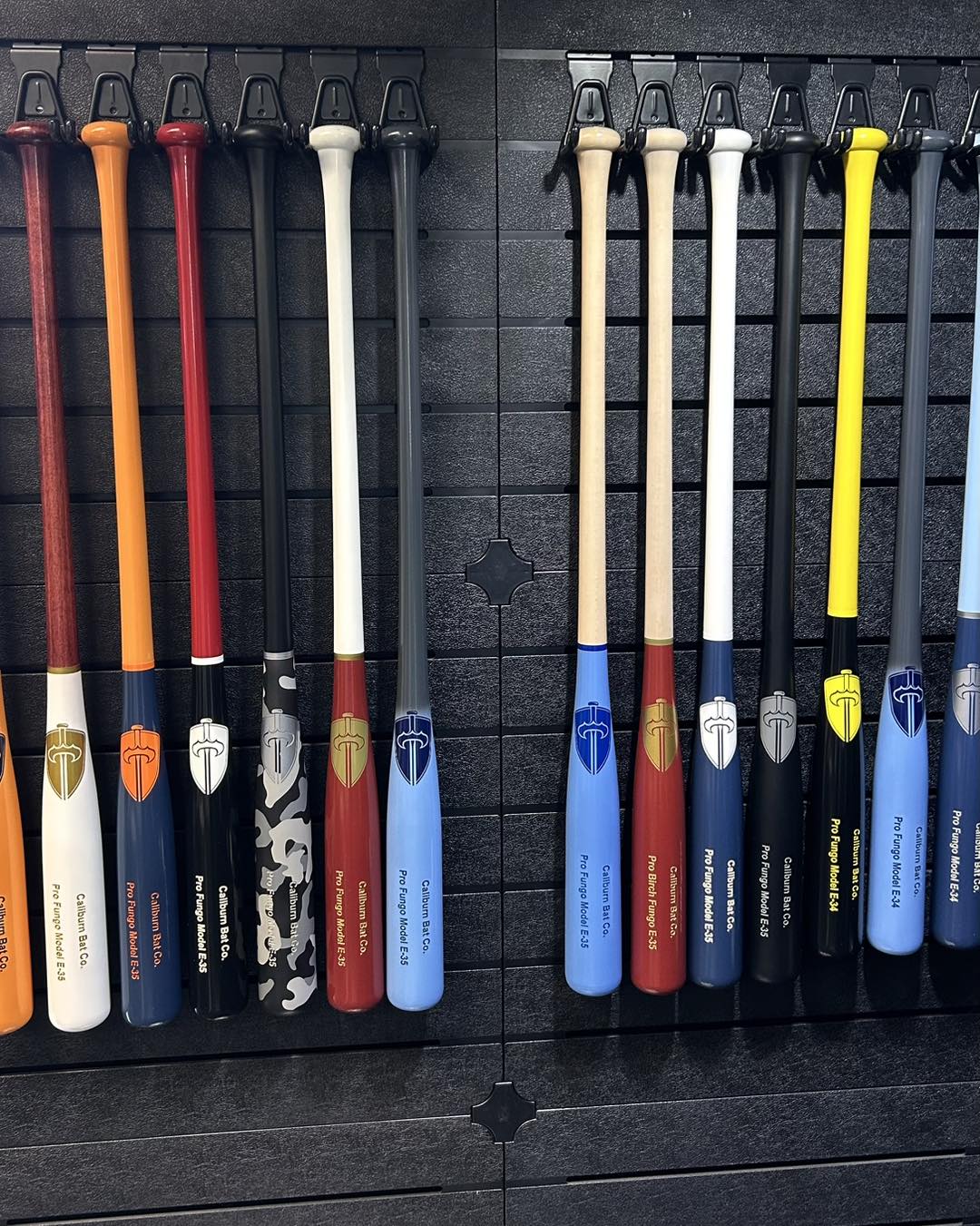 Fungo bats on a display wall